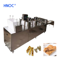 Ligne de production automatique de barres de riz, de flocons d'avoine, de cacahuètes, de snacks nutritionnels, de barres énergétiques protéinées au chocolat et à l'avoine