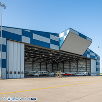 Hangar d'avion industriel neuf de 70 m de large à assemblage rapide, structure en acier à travée libre, grande capacité, sur mesure