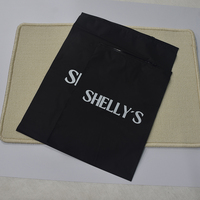 Sacs à fermeture éclair réutilisables en polyéthylène noir givré personnalisés pour l'expédition et l'emballage de vêtements, avec logo imprimé