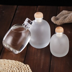 Wholesale 250ml 500ml Clear Frosted Wine Shochu <strong>Whiskey</strong> Vodka Sake Container Empty Round Glass Bottle <strong>With</strong> Cork for <strong>Honey</strong> - Product Image 5