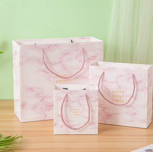 Ready-made INS-style pink marble-patterned gift <b>bag</b> high-end ribbon handbag packaging <b>bag</b> color-printed paper <b>bag</b> with bow tie - Product Image 1