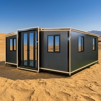 Maison conteneur extensible préfabriquée moderne noir mat avec éclairage LED pour glamping dans le désert, cabane de villégiature, vente en gros directe usine