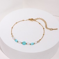 Ensemble de bijoux bohème en acier inoxydable plaqué or 18 carats avec des liens en forme de fleurs, imitation perle turquoise, collier et bracelet pour femmes