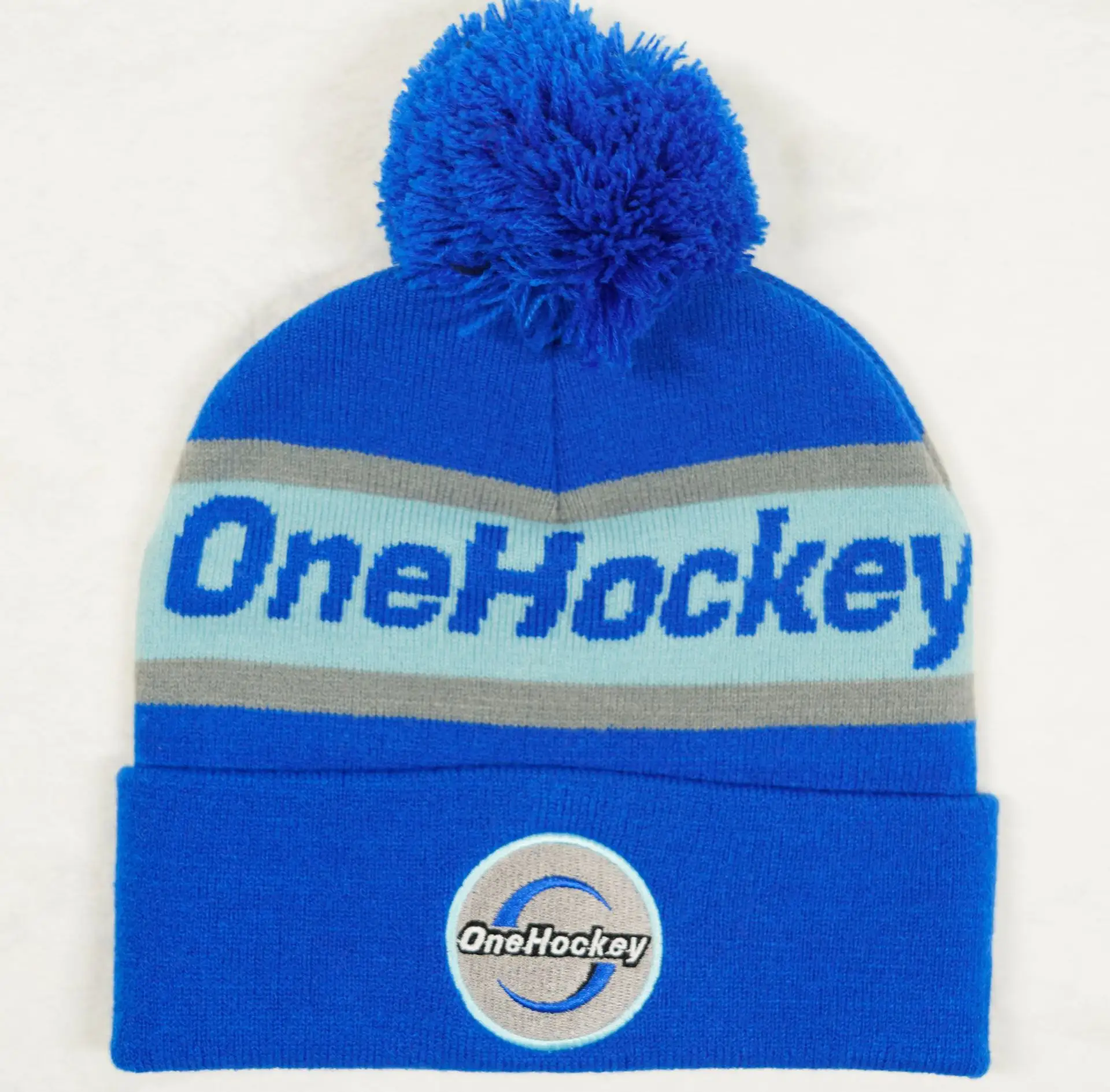 Oem Factory Direct Schädel Gestrickt Bobble Hat Afc Team Beanie Warme Winter Acryl Jacquard Stickerei Logo Pom Pom Beanie