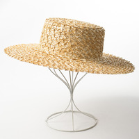 Summer New Handwoven Lace Straw Flat Top Hat pour les femmes Outdoor Tourism Sunshade and Sunscreen Beach Straw Hat