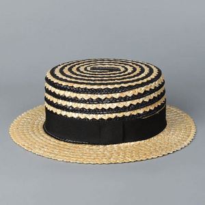 Chapeau de paille rayé pour femme, large bord, protection solaire, style boater, idéal plage et extérieur, collection été 2025 - Product Image 1