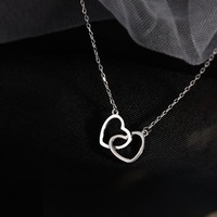 Collier en plaqué or pour la saint-valentin, chaîne de clavicule, pendentif en Double coeur connecté, ajouré