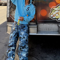 Pantalon Homme en Jean Personnalisé, Coupe Ample, Couleur Délavée, Surdimensionné, en Coton Lourd 100%, avec Étiquette en Cuir Privée et Motifs Graffiti