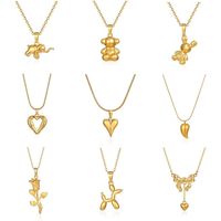 Collier tendance Saint-Valentin avec pendentif éléphant doré, fleur, cœur et mini-ours en acier inoxydable plaqué or 18 carats