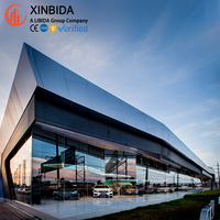 Bâtiment de vente automobile préfabriqué en structure acier avec façade vitrée
