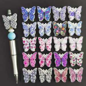 ชาร์มปากกาพิมพ์ลาย UV แบบกำหนดเอง ขายดี ชาร์มลูกปัดซิลิโคนลายการ์ตูนผีเสื้อ PVC - Product Image 1