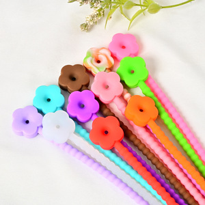 Ataduras de cables de silicona con forma de flor, organizador de cables desmontable para escritorio de oficina, gestión de cables de datos, color aleatorio - Product Image 2