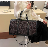 Haut de gamme femmes grande capacité Portable bandoulière imprimé léopard sac à bandoulière à la mode tout match deux poignées fermeture éclair pour voyage
