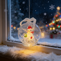 Adorno navideño de vidrio de borosilicato soplado a mano con iluminación LED con muñeco de nieve en el interior para decoración festiva