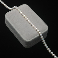 Vente en gros de perles d'eau douce naturelles blanches de qualité AAA+ de 6 mm, presque rondes, avec trou percé pour la fabrication de bijoux