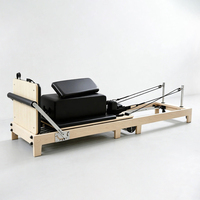 Appareil de Pilates Reformer pliable en bois d'érable certifié CE, durable et réglable, pour l'entraînement au yoga en studio
