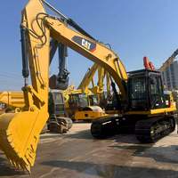 Excavatrice CAT 323D2L de 20 tonnes, grande benne, moteur puissant, pour travaux lourds de terrassement sur sites montagneux boueux, engin de construction