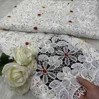 Tissu en dentelle écologique tissé avec des pierres de broderie guipure en diamant et des points ronds de luxe pour robes de filles et de garçons 2025