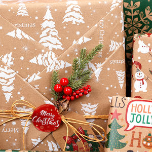 Venta al por mayor 80g Navidad oro estampado papel Kraft 43*300cm regalo lujo embalaje personalizado rollo de papel de regalo - Product Image 4