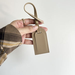 Etiqueta de Equipaje de Cuero PU con Logotipo Personalizado OEM ODM, Correa de Cincha con Remache Metálico, Forma de Arco Simple, Regalo Promocional para Maletas de Viaje - Product Image 3