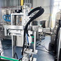 Ligne de production automatique rotative pour le remplissage, le bouchage, l'étiquetage et l'emballage de flacons de parfum
