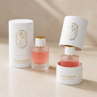 Boîte rigide ronde de luxe, impression dorée personnalisée, emballage cylindrique blanc pour flacon de parfum