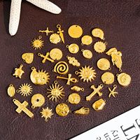 Breloques personnalisées en gros pour la fabrication de bijoux – Pendentifs en acier inoxydable doré, coquillage, étoile de mer, soleil, croix de Jésus