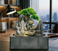 Fontaine de table Ganesha en argent avec cascade de lotus, lumière LED et bassin carré pour la décoration zen de la maison ou du bureau