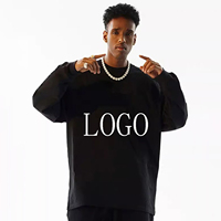 Hochwertiges, schweres, ringgesponnenes Baumwoll-T-Shirt in Uni-Weiß, Oversize-Schnitt, langärmlig, mit Rundhalsausschnitt, individuell gestaltbar.