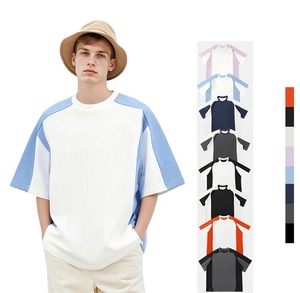 T-shirt a maniche corte color block, vestibilità ampia con spalle scese, asciugatura rapida, traspirante, maniche raglan, top casual unisex di tendenza - Product Image 1