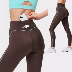 Leggings de yoga à haute élasticité, respirants, avec lignes contrastées, taille en V, tissu fonctionnel, séchage rapide - Product Image 1