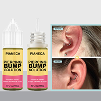 Huile pour l'élimination des cicatrices chéloïdes nettoyante du nez et des oreilles pour l'élimination des bosses chéloïdes Solution pour l'élimination des bosses de piercing OEM de marque privée