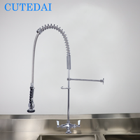 Robinet de cuisine commercial industriel en laiton à deux poignées, haute pression, résistant à la température, avec douchette extractible pour pré-évier, à montage sur plan.