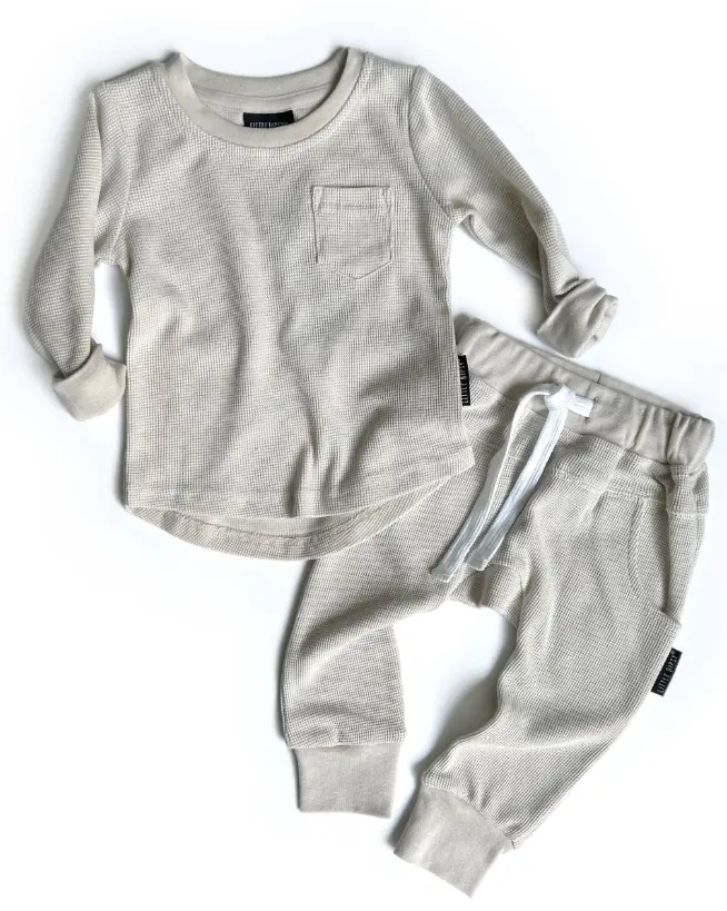 Bébé automne vêtements t-shirt et pantalon gaufré manches longues ourlet incurvé poche pull t-shirt pantalon ensemble