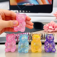 Vente en gros : Ours anti-stress souple scintillant effet aurore, motif vortex, emballé en boîte colorée