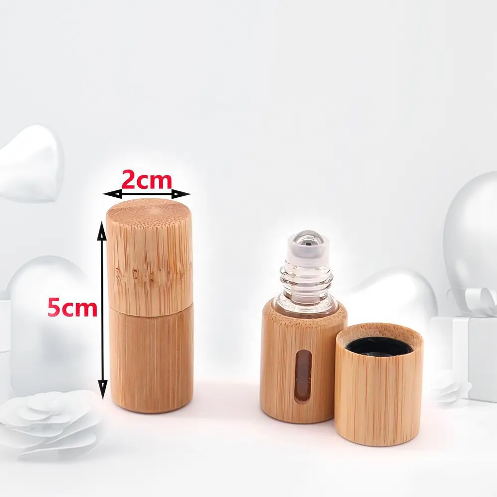 Botol parfum rol minyak kosong 10ML kustom baja tahan karat dengan desain kayu bambu bola untuk pencetakan layar OEM Serum