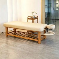 Table de massage robuste en cuir PU avec cadre en bois, repose-tête et rangement à lattes pour salon de beauté