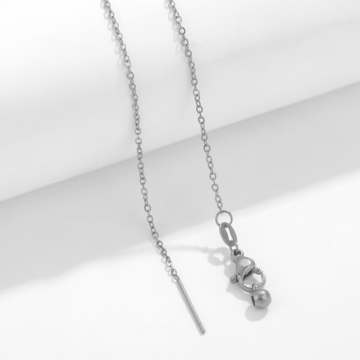 Cadena cruzada de plata 1.2