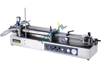Machine de remplissage horizontale semi-automatique à tête unique pour boisson lait de jus chimique pour bouteilles en métal en verre pour la nourriture