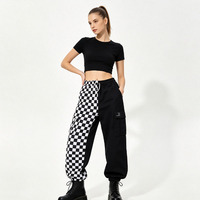 Pantalon large taille haute en maille côtelée personnalisée, imprimé damier colorblock tendance, style universitaire haut de gamme