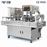 Machine de remplissage et de scellage automatique haute vitesse pour yaourt, lait de soja, gelée, bouillie, emballage alimentaire en boîte plastique