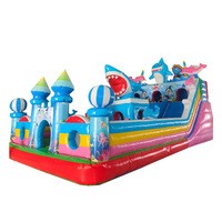 Grand château gonflable sur le thème de l'océan, requin, dauphin, château sauteur avec toboggan, équipement de jeux pour enfants en plein air