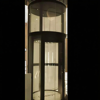 Ascenseur panoramique moderne sans engrenages pour villa à plusieurs étages, en verre rond, OEM ODM personnalisé