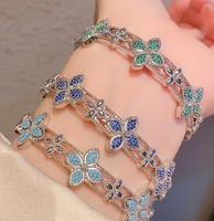 Bracelet à breloques de trèfle à quatre feuilles coloré pour femmes bijoux en Zircon plaqué or-cadeau d'anniversaire haut de gamme de niche de luxe léger