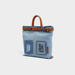 2025 nuevo bolso de mezclilla azul claro cuero marrón costura Retro bolsillo decorado bolso de mujer - Product Image 1
