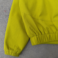 Blouson bomber à capuche jaune vif, coupe oversize, tissu texturé, streetwear 2025, personnalisable OEM/ODM, faible MOQ pour les marques de mode