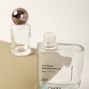 30ml 50ml Glas Kosmetik flasche Elegante klare, einzigartige Form mit goldenem Kugel deckel und innerem Stopfen für ätherisches Hautpflege öl - Product Image 4