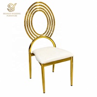 Chaise de luxe ovale en fer doré électrolytique avec assise en cuir blanc pour salle à manger d'hôtel, salon, villa, événements et banquets de mariage