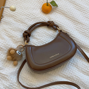 Sac à main messager coréen pour femme, nouvelle collection automne-hiver, en PU, couleur unie, avec fermeture éclair, portable et durable, style tendance. - Product Image 1