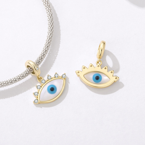 Amuleto de ojo chapado en oro con piedras de circonita y centro azul para regalo de joyería de moda unisex - Product Image 4